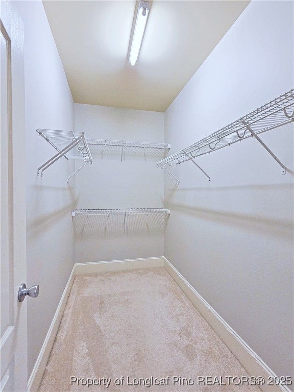 175 Pine Hawk Drive Spring Lake, NC 28390 - Photo 23 of 41 a view of a room with racks on the wall