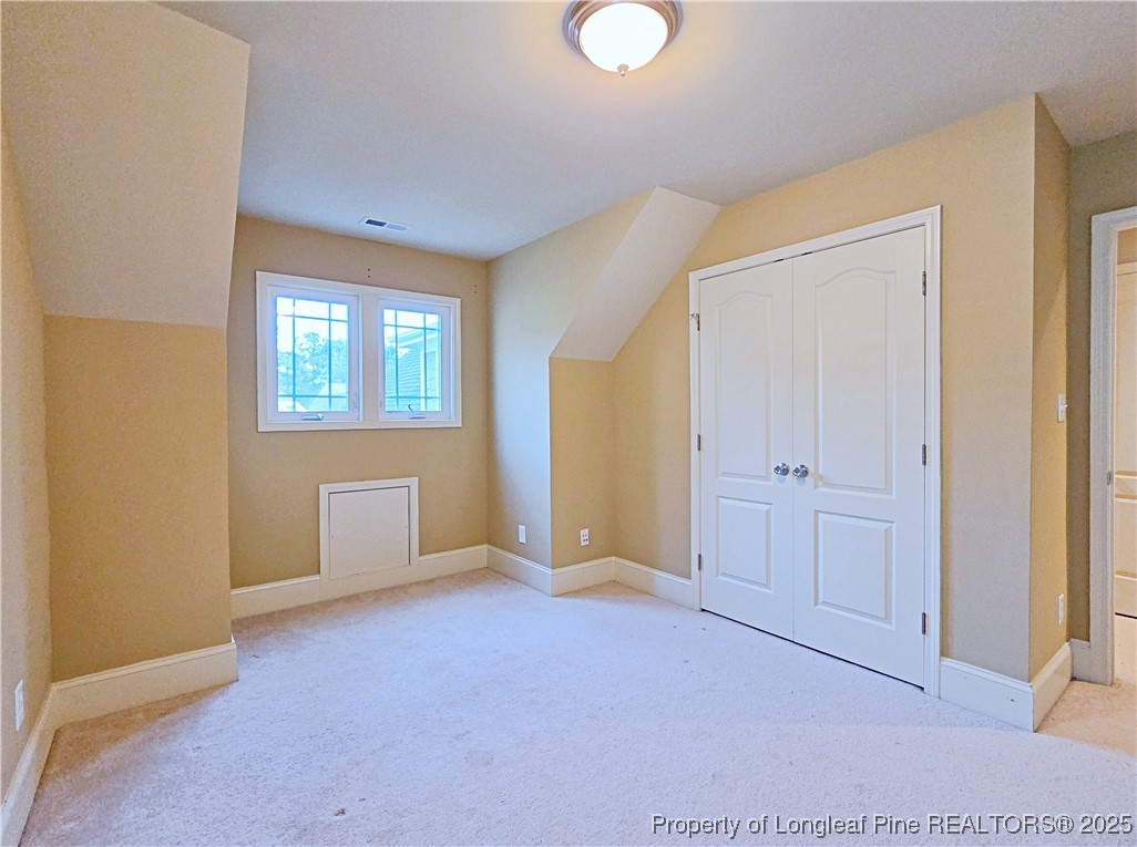 175 Pine Hawk Drive Spring Lake, NC 28390 - Photo 30 of 41 an empty room with windows
