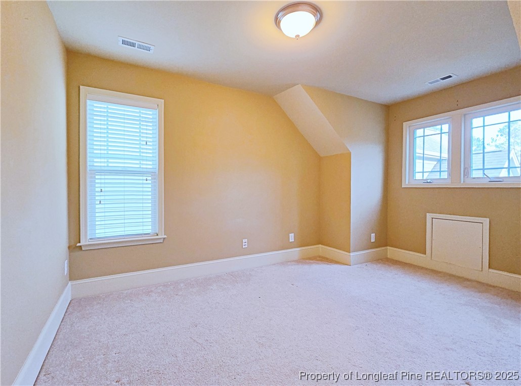 175 Pine Hawk Drive Spring Lake, NC 28390 - Photo 31 of 41 an empty room with windows