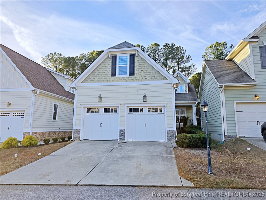 175 Pine Hawk Drive Spring Lake, NC 28390 - Photo 36 of 41 a view of a house with a yard