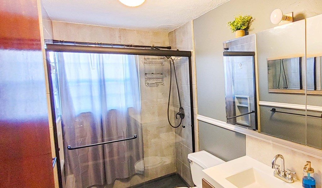 1 Walker Road, Unit 1 North Andover, MA 01845 - Photo 12 of 17 a bathroom with a shower and a sink