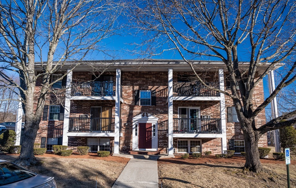 1 Walker Road, Unit 1 North Andover, MA 01845 - Photo 15 of 17 a front view of a building with street view