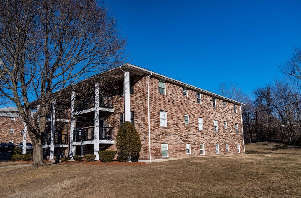 1 Walker Road, Unit 1 North Andover, MA 01845 - Photo 17 of 17 front view of a building with a street