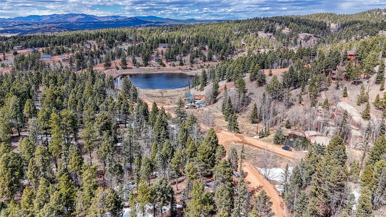 244 Spring Valley Lane Florissant, CO 80816 - Photo 17 of 17 a view of a city from a yard