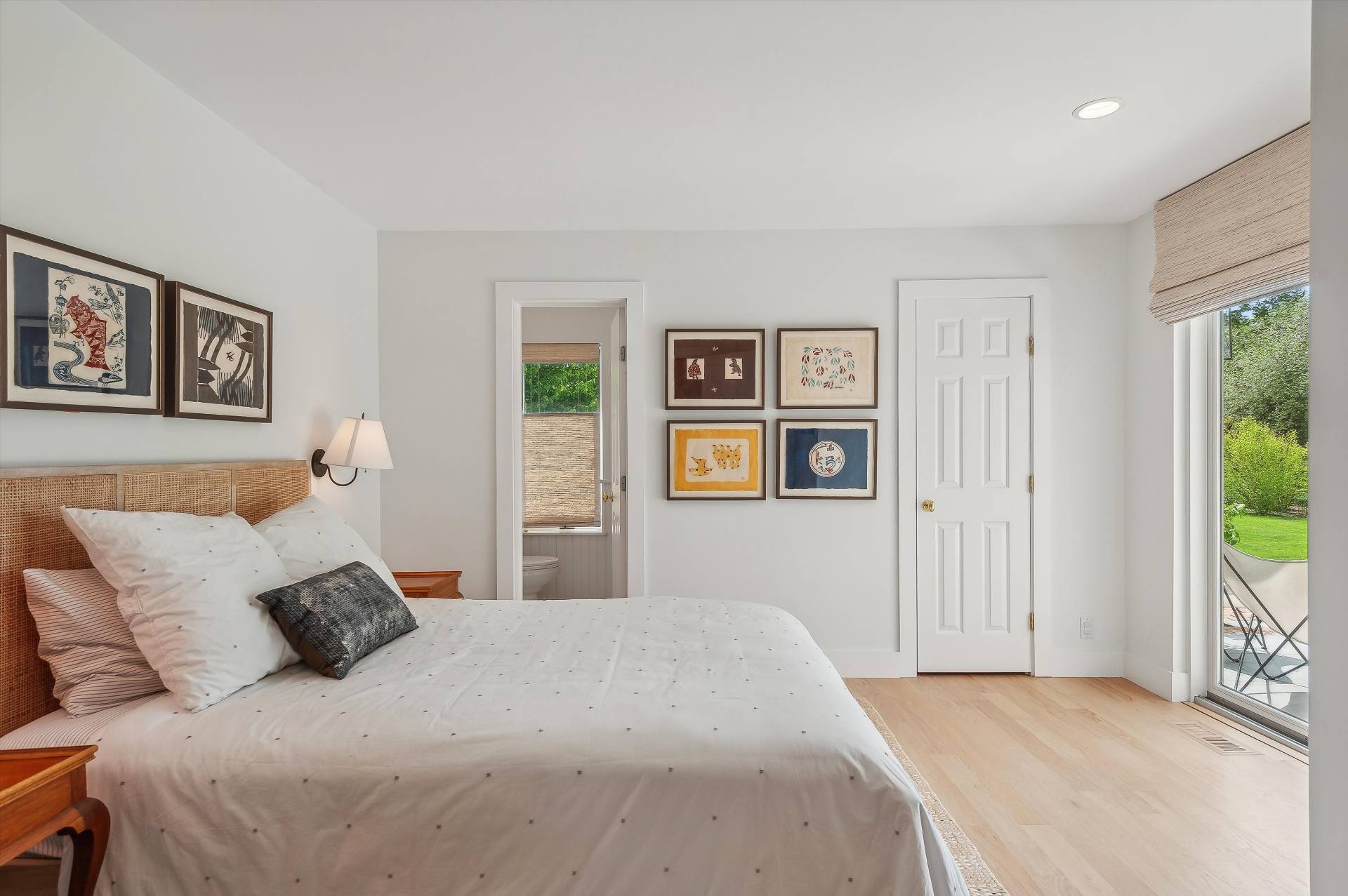 127 Narrow Lane South Water Mill, NY 11976 - Photo 14 of 37 a bedroom with a large bed and a window