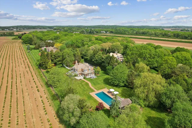 a view of a lake with a yard