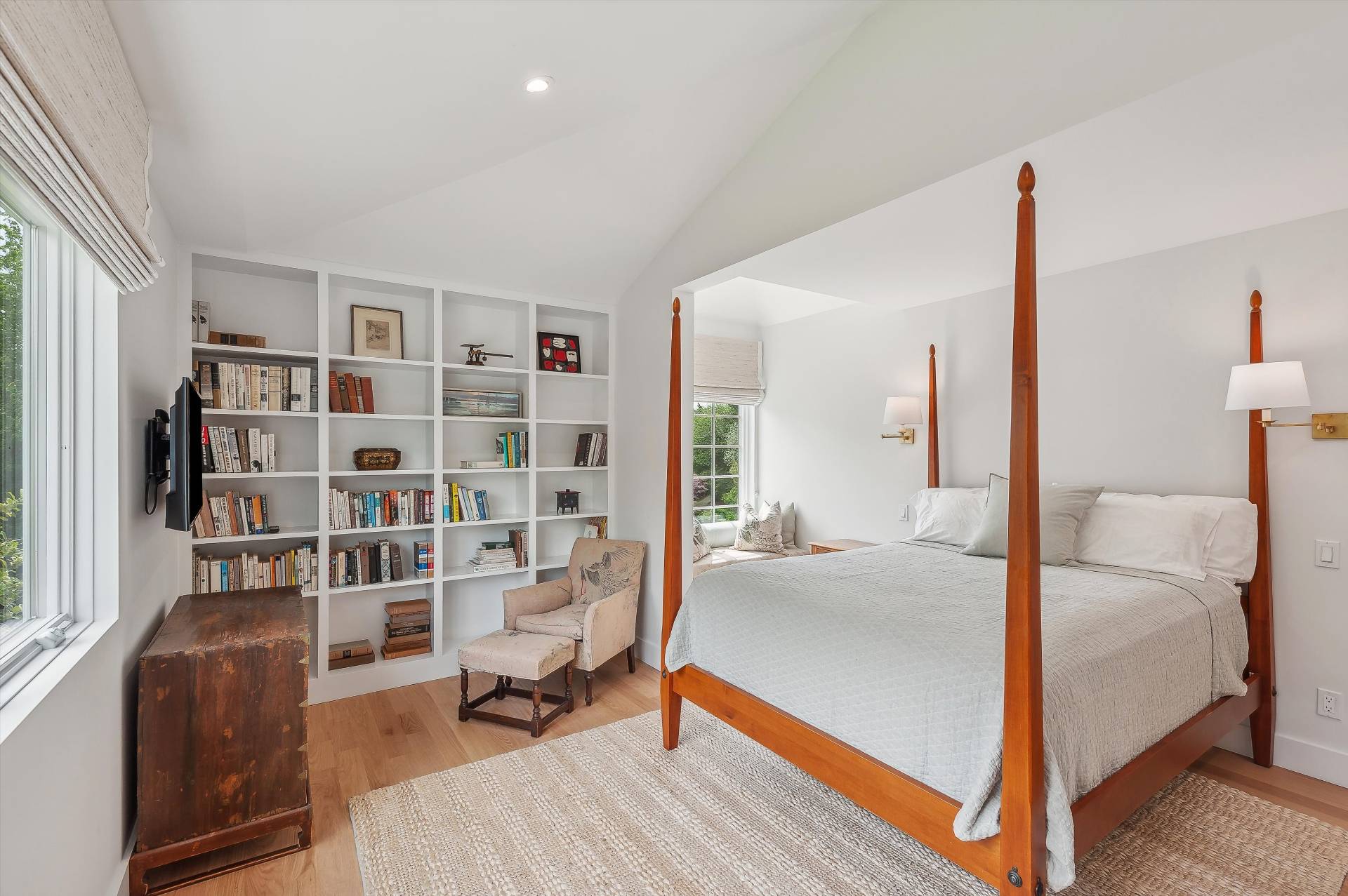 127 Narrow Lane South Water Mill, NY 11976 - Photo 21 of 37 a bedroom with furniture and a book shelf