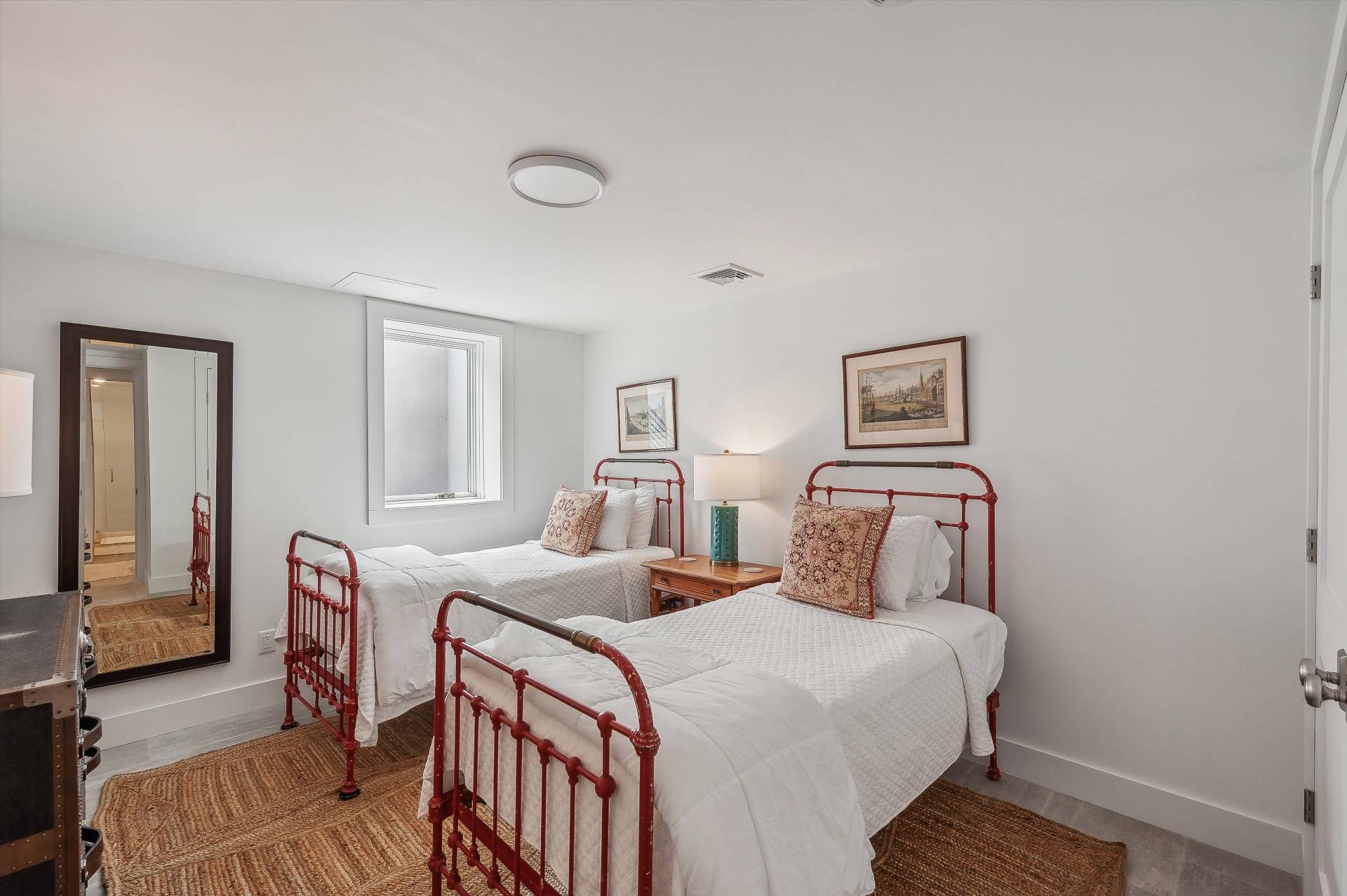 127 Narrow Lane South Water Mill, NY 11976 - Photo 25 of 37 a bedroom with a bed and wooden floor