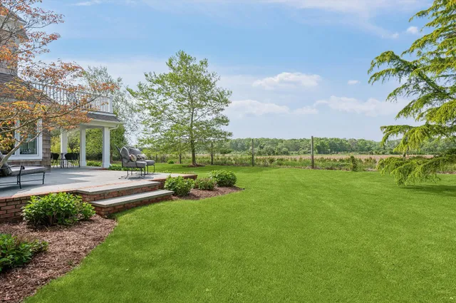 a view of a garden with houses