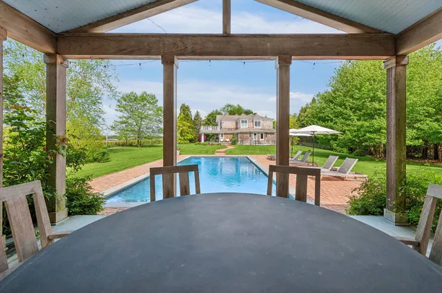 a view of porch with a garden