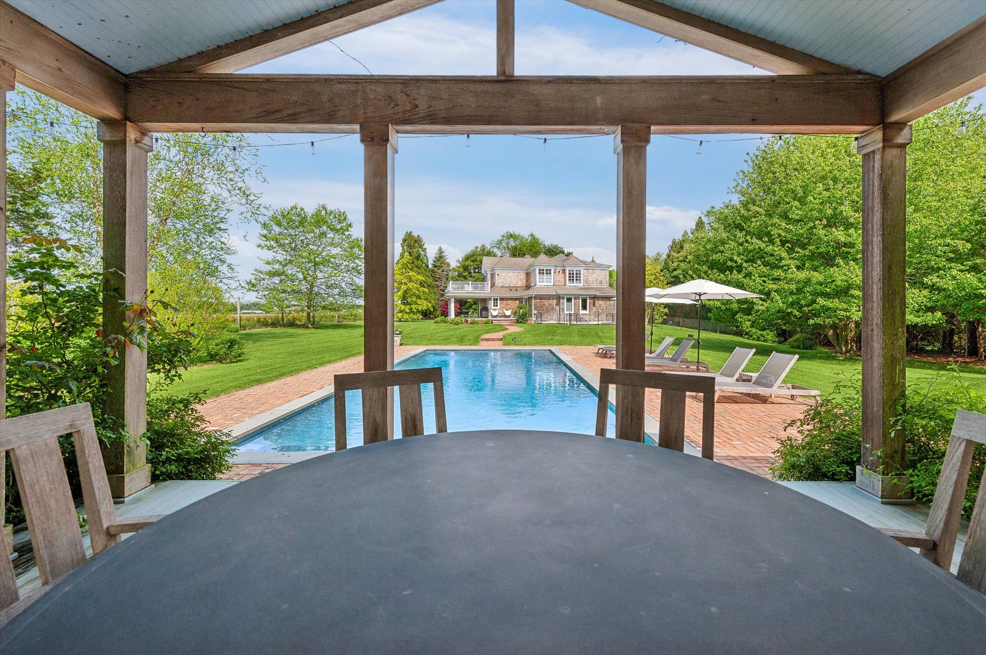 127 Narrow Lane South Water Mill, NY 11976 - Photo 34 of 37 a view of porch with a garden