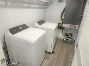 a utility room with dryer and washer