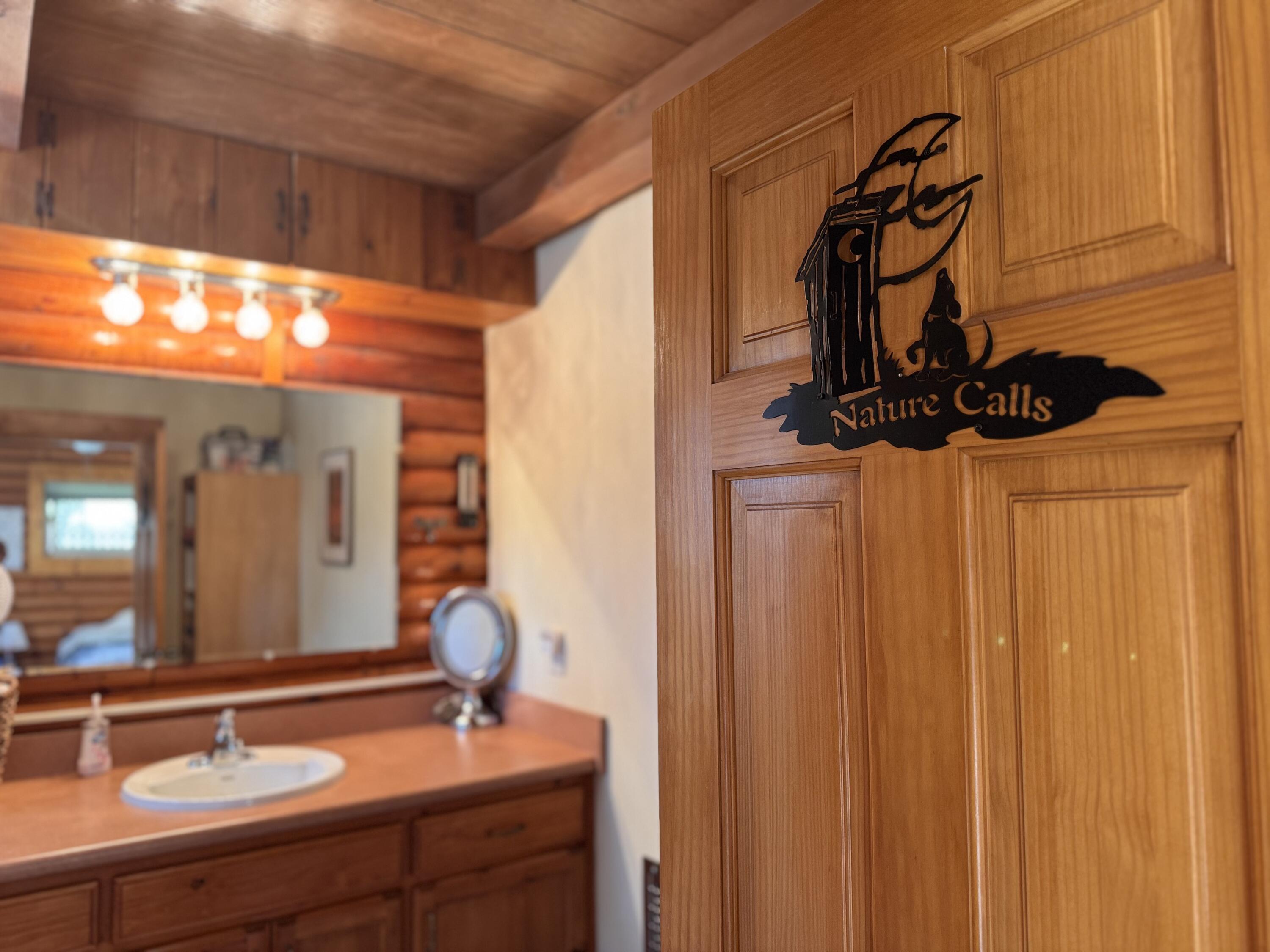 51911 Hogback Miramonte, CA 93641 - Photo 29 of 49 a bathroom with a sink and a mirror