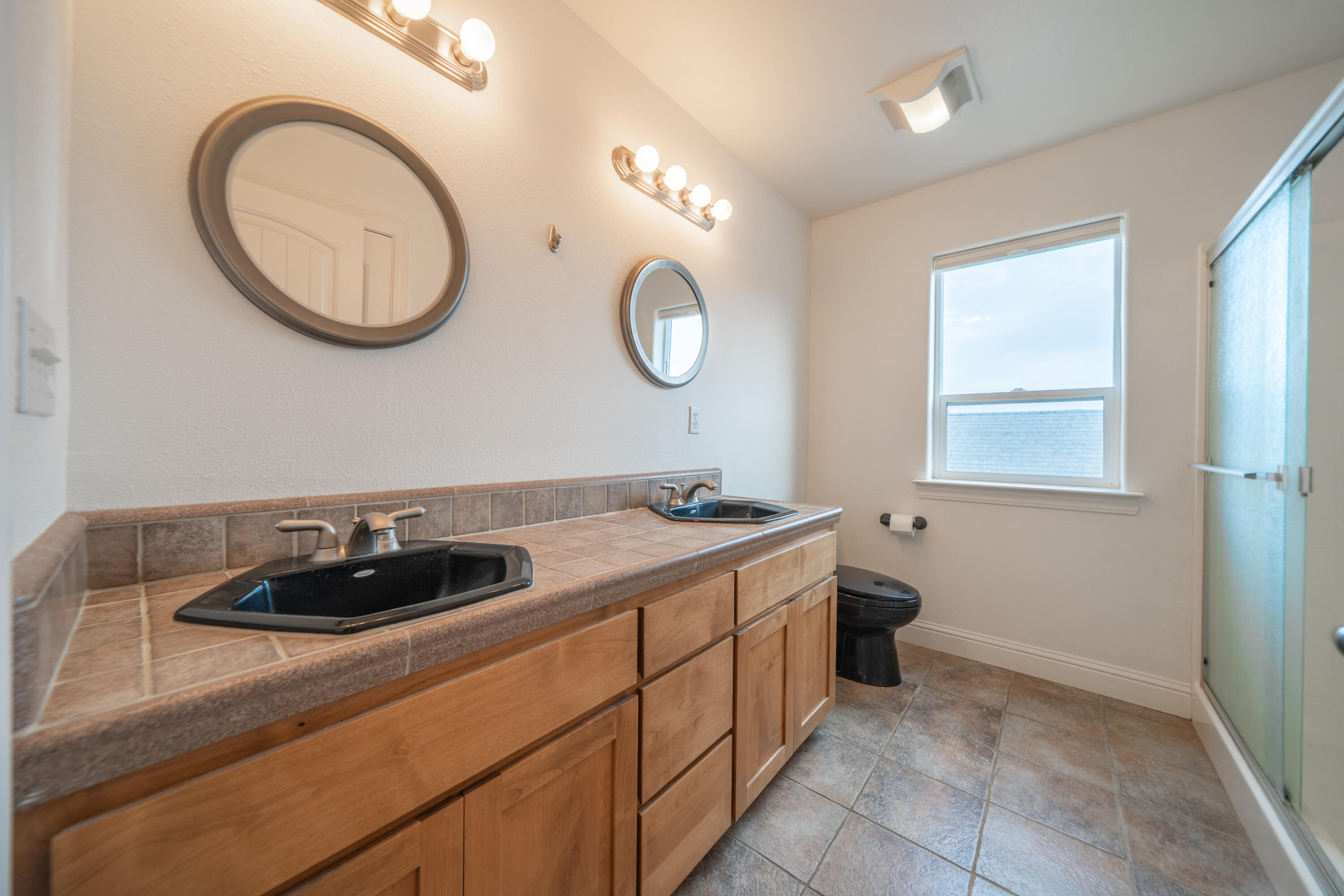 8180 Whispering Oaks Road Redding, CA 96002 - Photo 46 of 100 a kitchen with a sink and a stove