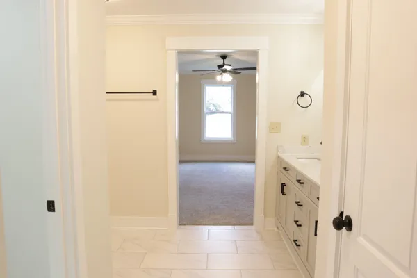 a view of walk in closet with window