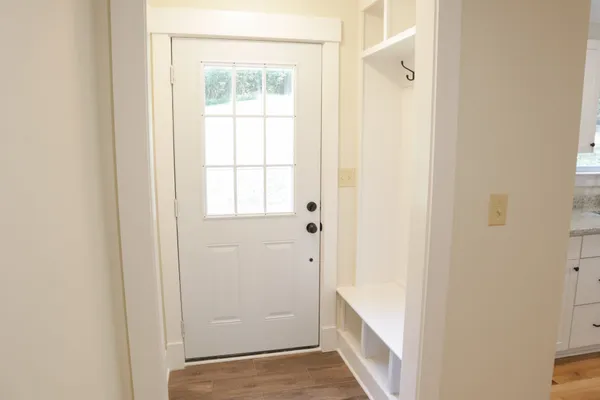 a view of a bathroom from the hallway