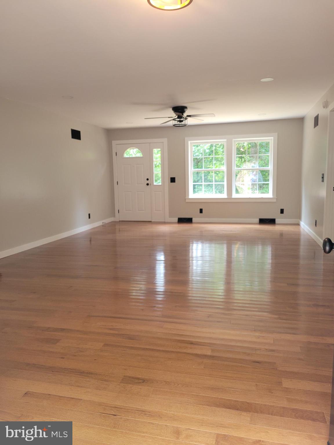 99 Riggs Hollow Road Capon Bridge, WV 26711 - Photo 2 of 33 Living room looking at front door