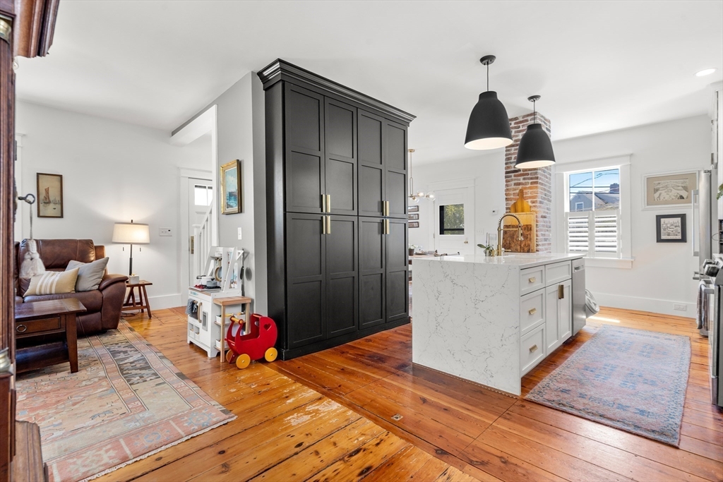 1 Gregory Street Marblehead, MA 01945 - Photo 13 of 42 a living room with furniture and a wooden floor