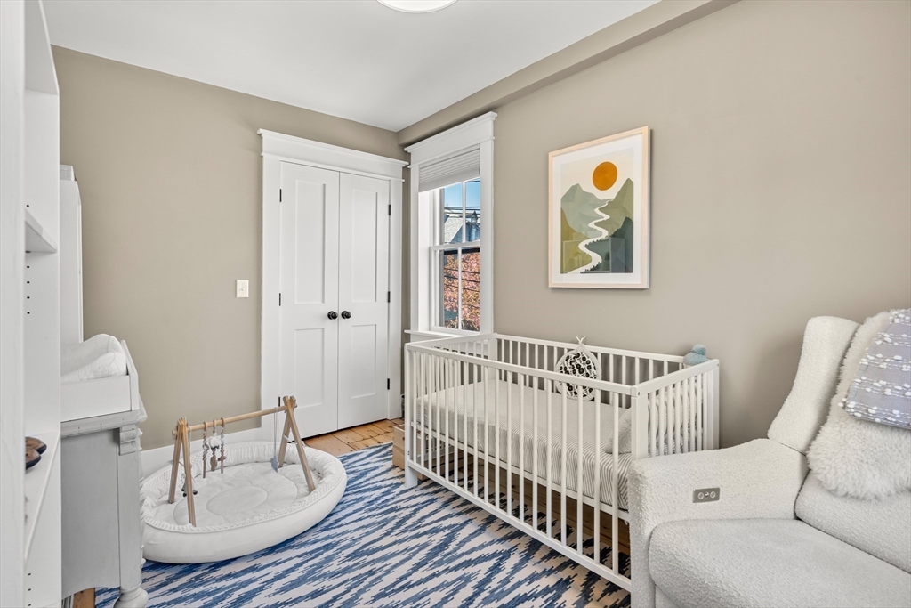 1 Gregory Street Marblehead, MA 01945 - Photo 27 of 42 a bedroom with furniture and a window