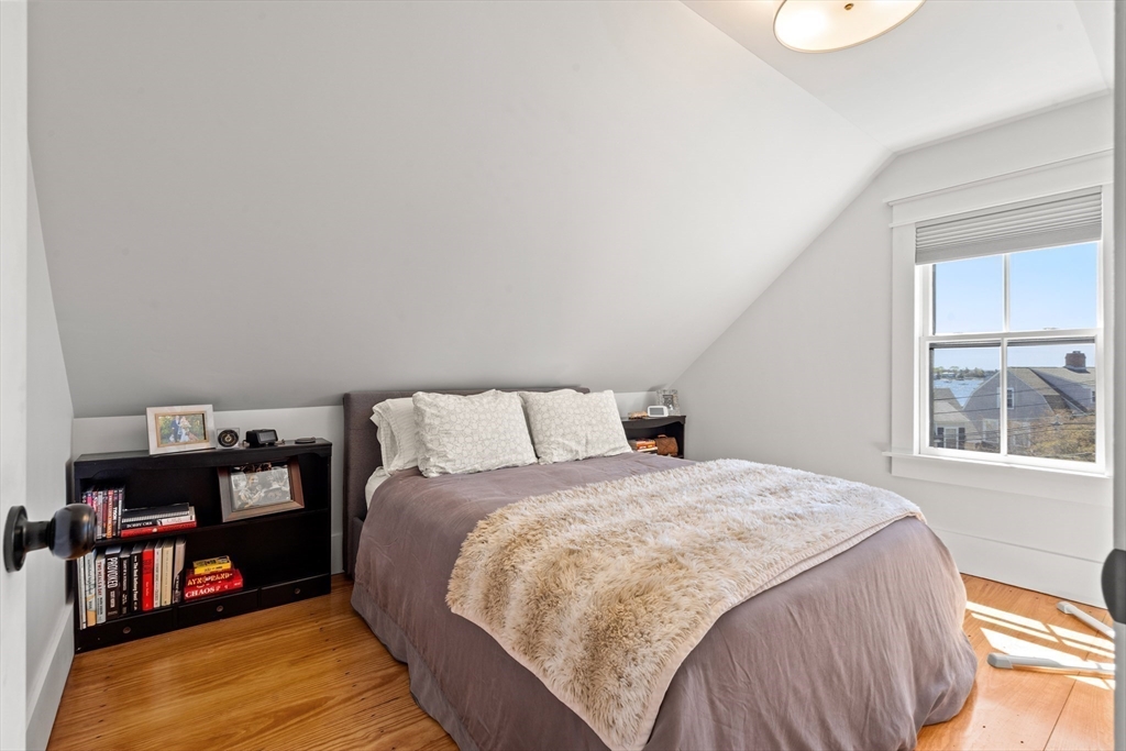 1 Gregory Street Marblehead, MA 01945 - Photo 30 of 42 a bedroom with a bed and dresser