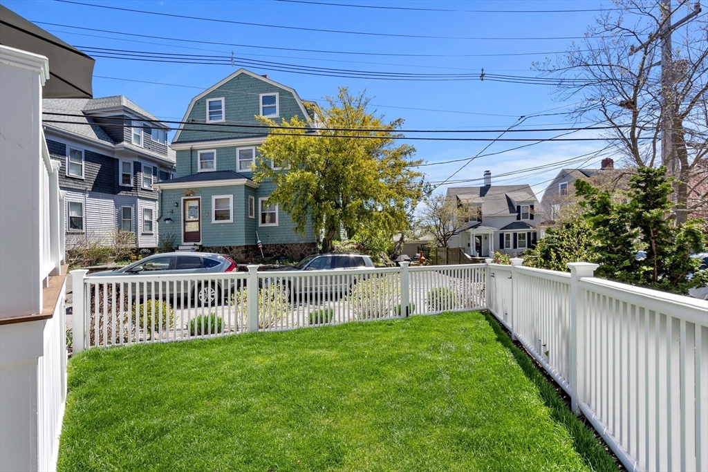 1 Gregory Street Marblehead, MA 01945 - Photo 4 of 42 front view of a house with a yard
