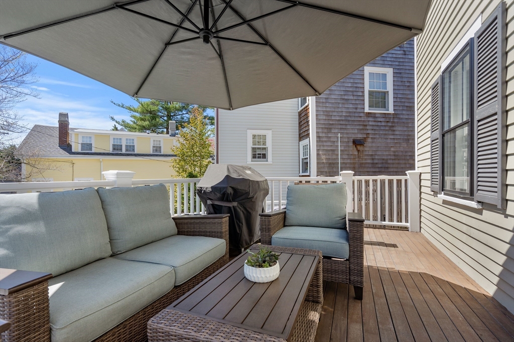 1 Gregory Street Marblehead, MA 01945 - Photo 7 of 42 a view of a patio on the roof deck