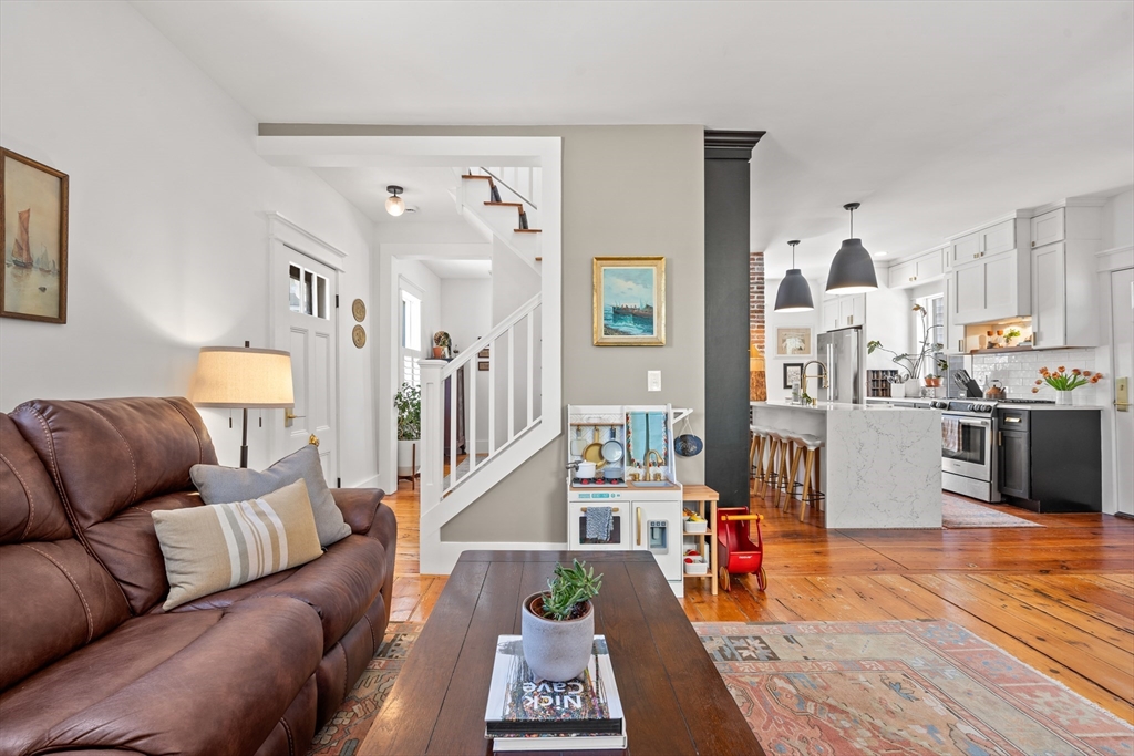 1 Gregory Street Marblehead, MA 01945 - Photo 9 of 42 a living room with furniture and wooden floor