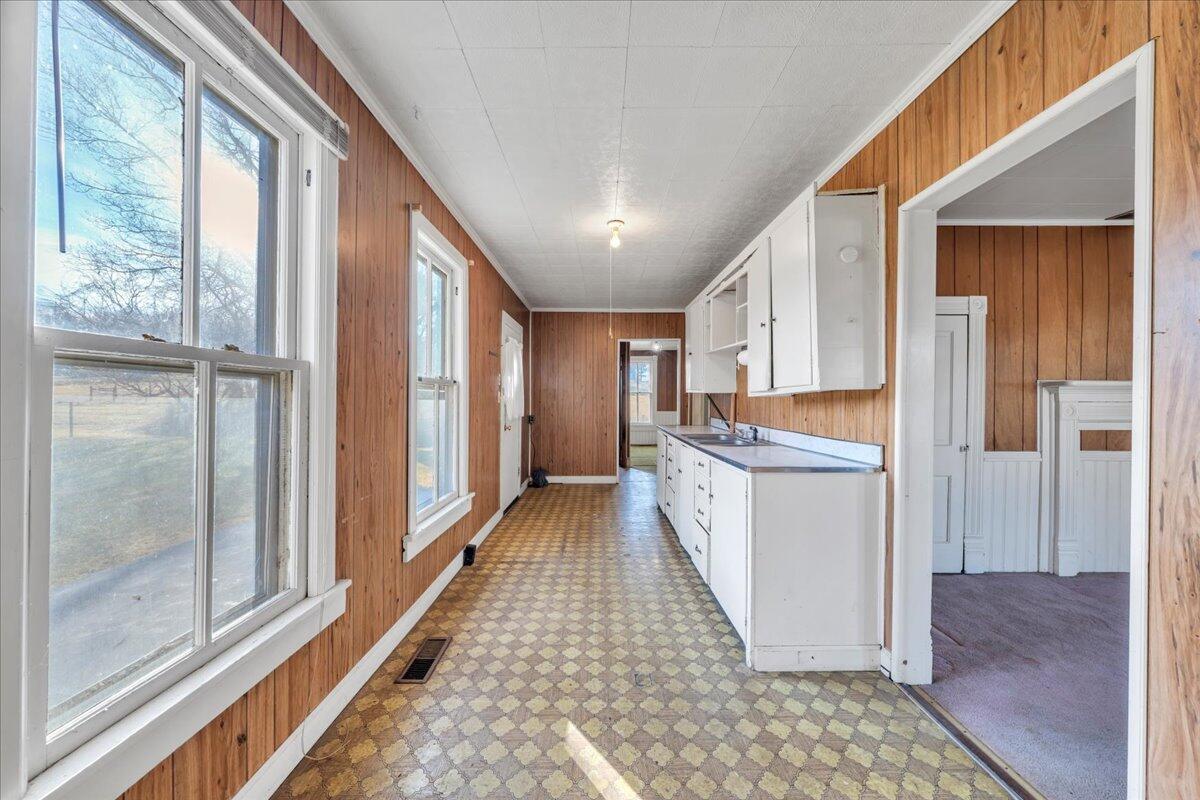 5402 Roanoke Road Troutville, VA 24175 - Photo 15 of 54 a kitchen with refrigerator cabinets and a sink