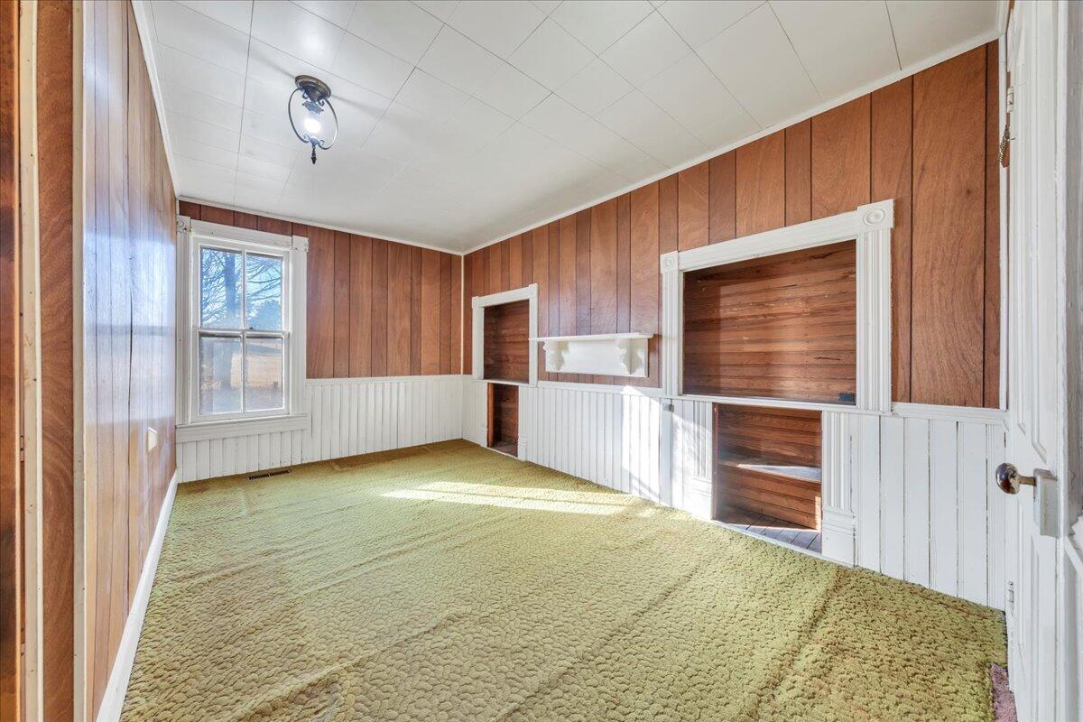 5402 Roanoke Road Troutville, VA 24175 - Photo 20 of 54 a view of a kitchen with wooden cabinet and a refrigerator