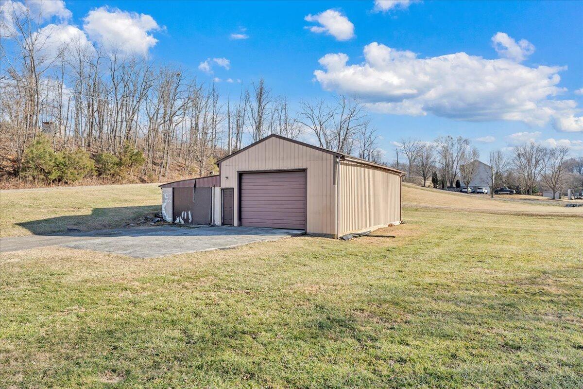 5402 Roanoke Road Troutville, VA 24175 - Photo 32 of 54 a house with yard in front of it