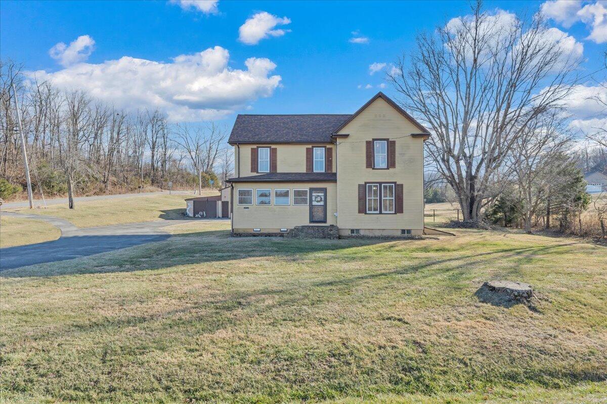 5402 Roanoke Road Troutville, VA 24175 - Photo 4 of 54 a view of a house with a yard