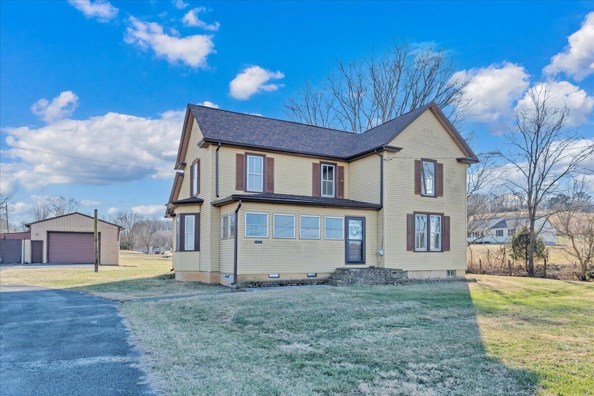 5402 Roanoke Road Troutville, VA 24175 - Photo 5 of 54 front view of a house with a yard