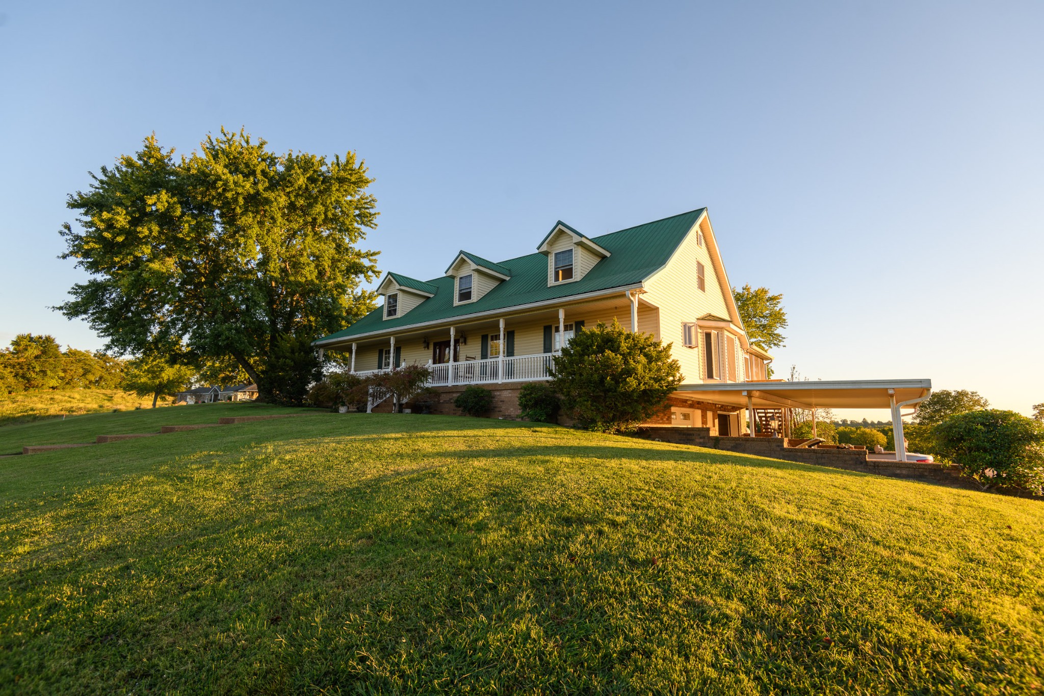 1534 Old Shannon Road Lebanon, TN 37090 - Photo 9 of 56 a front view of a house with a yard and lake view