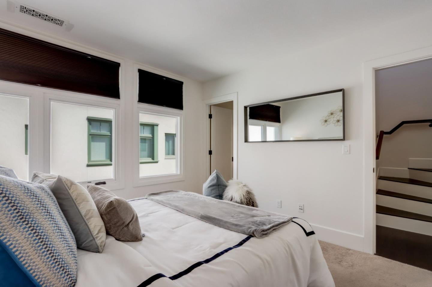 612 Allerton Loop Campbell, CA 95008 - Photo 14 of 38 a bedroom with a bed and a flat screen tv