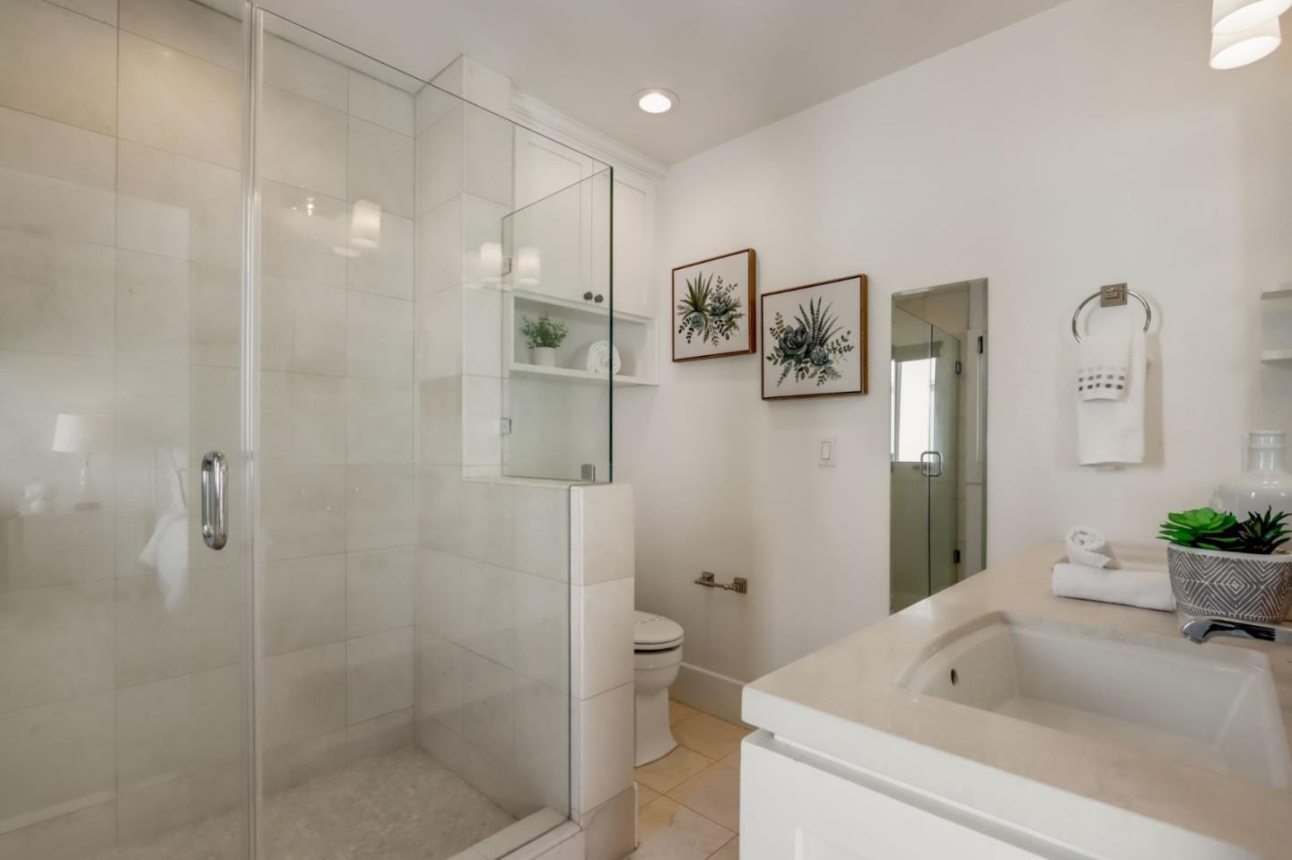 612 Allerton Loop Campbell, CA 95008 - Photo 17 of 38 a bathroom with a shower a toilet and a sink