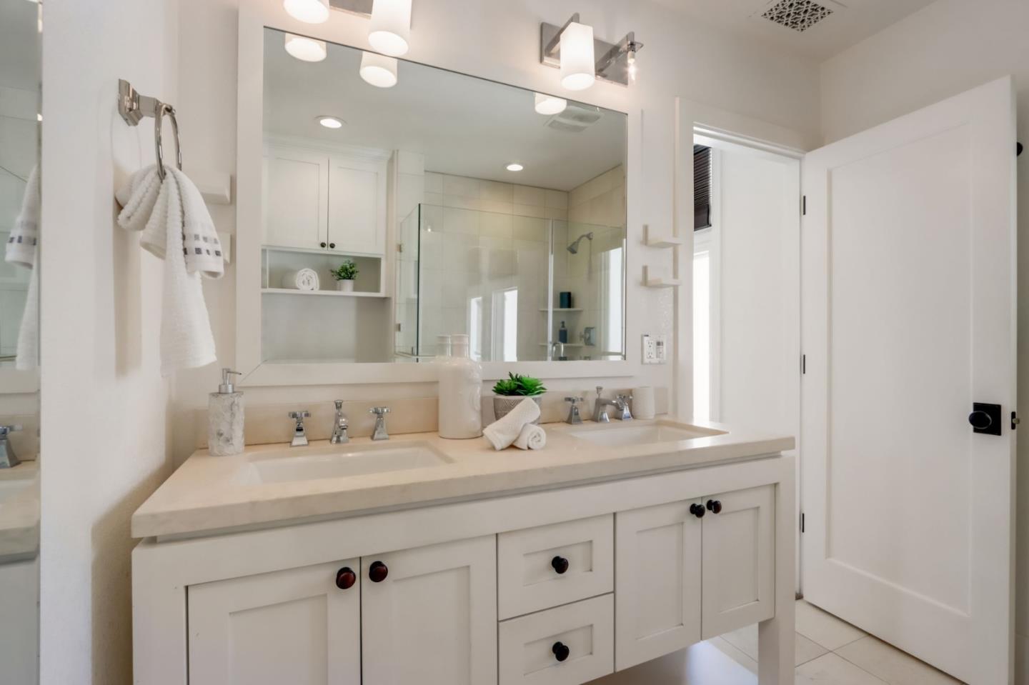 612 Allerton Loop Campbell, CA 95008 - Photo 18 of 38 a bathroom with a sink double vanity and a mirror