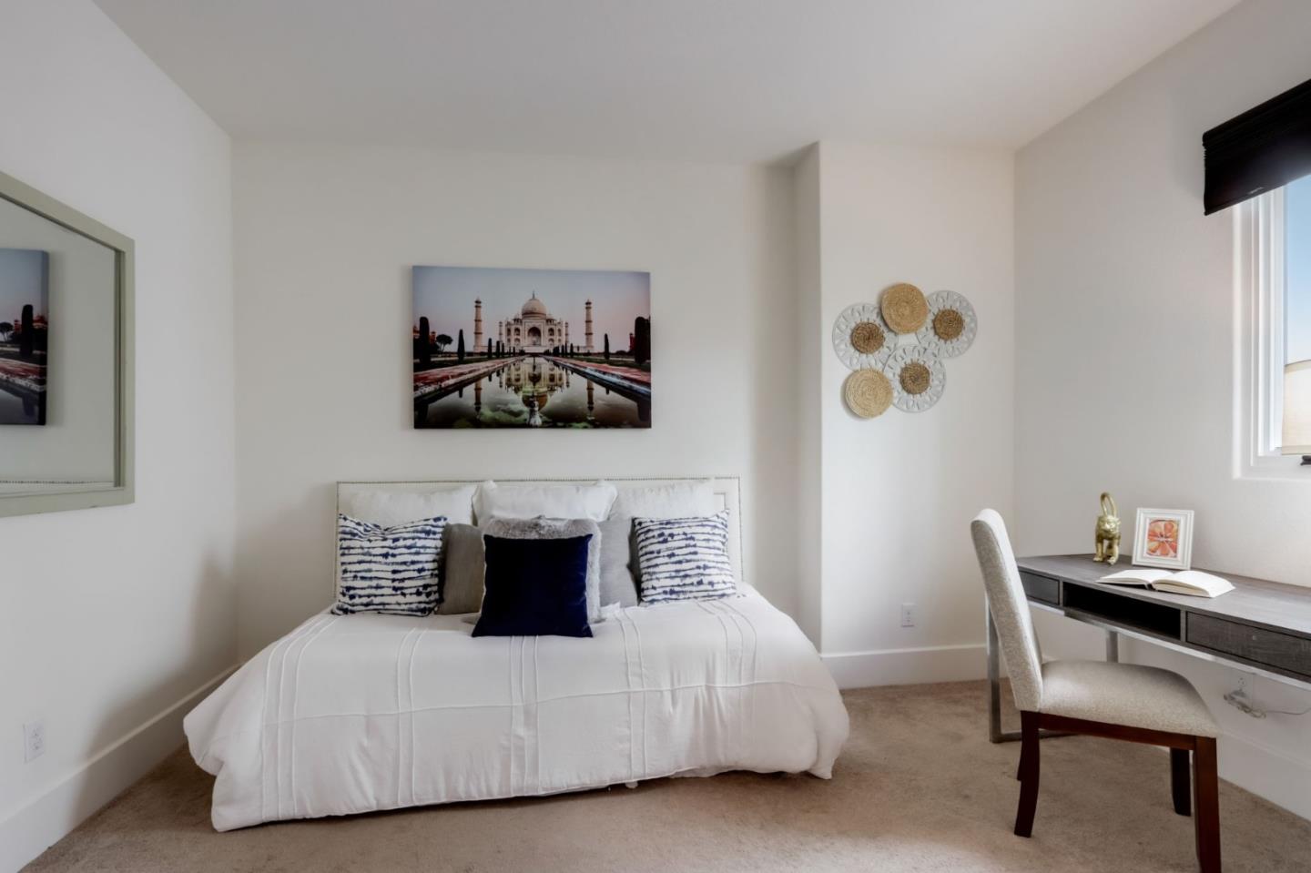 612 Allerton Loop Campbell, CA 95008 - Photo 19 of 38 a bedroom with a bed and a chair