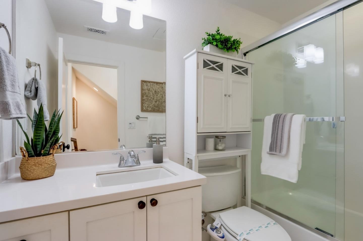 612 Allerton Loop Campbell, CA 95008 - Photo 22 of 38 a bathroom with a sink a toilet and shower