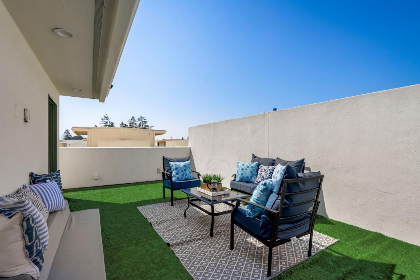 612 Allerton Loop Campbell, CA 95008 - Photo 24 of 38 a backyard of a house with table and chairs