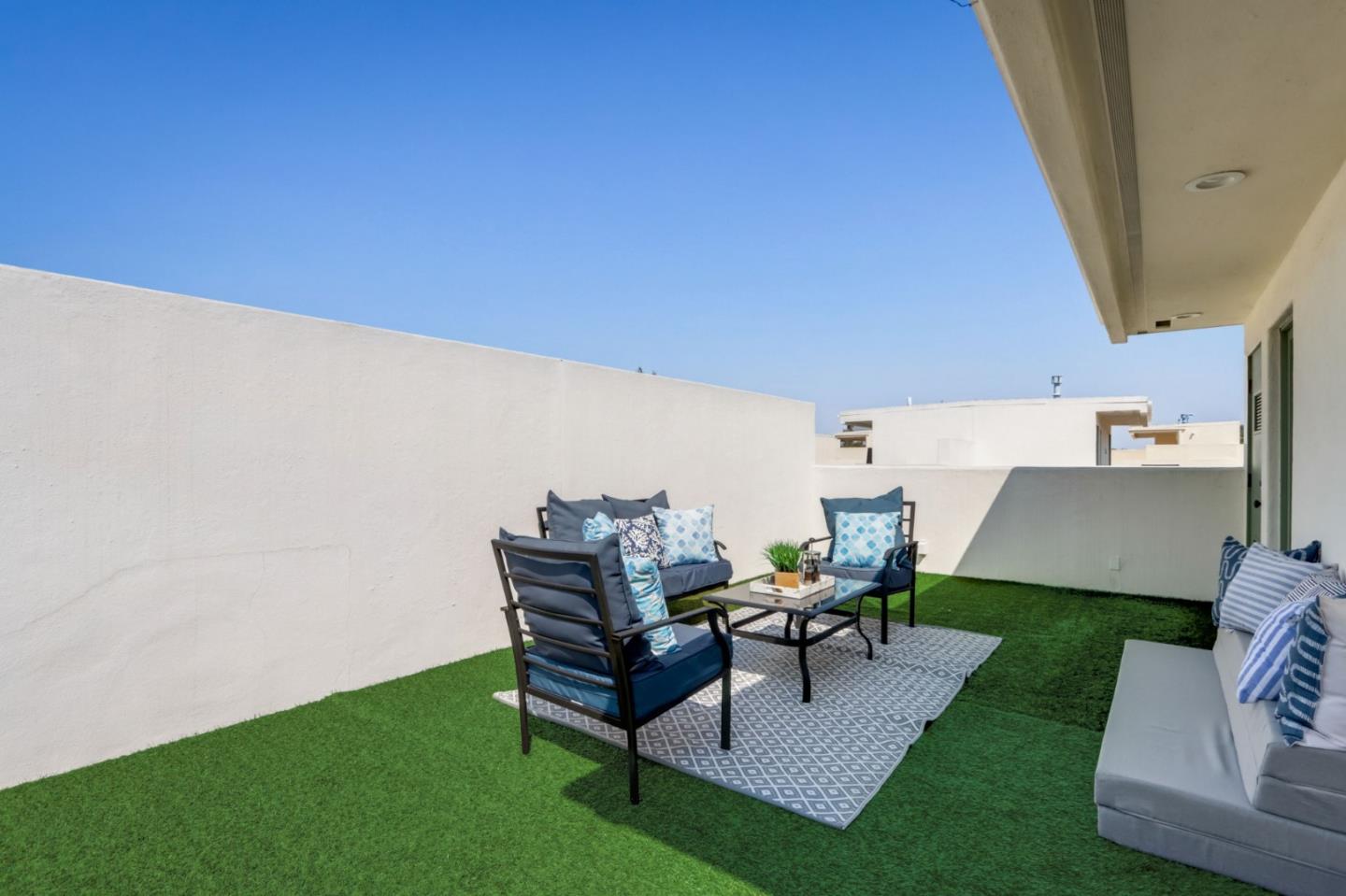 612 Allerton Loop Campbell, CA 95008 - Photo 25 of 38 a view of a patio with table and chairs