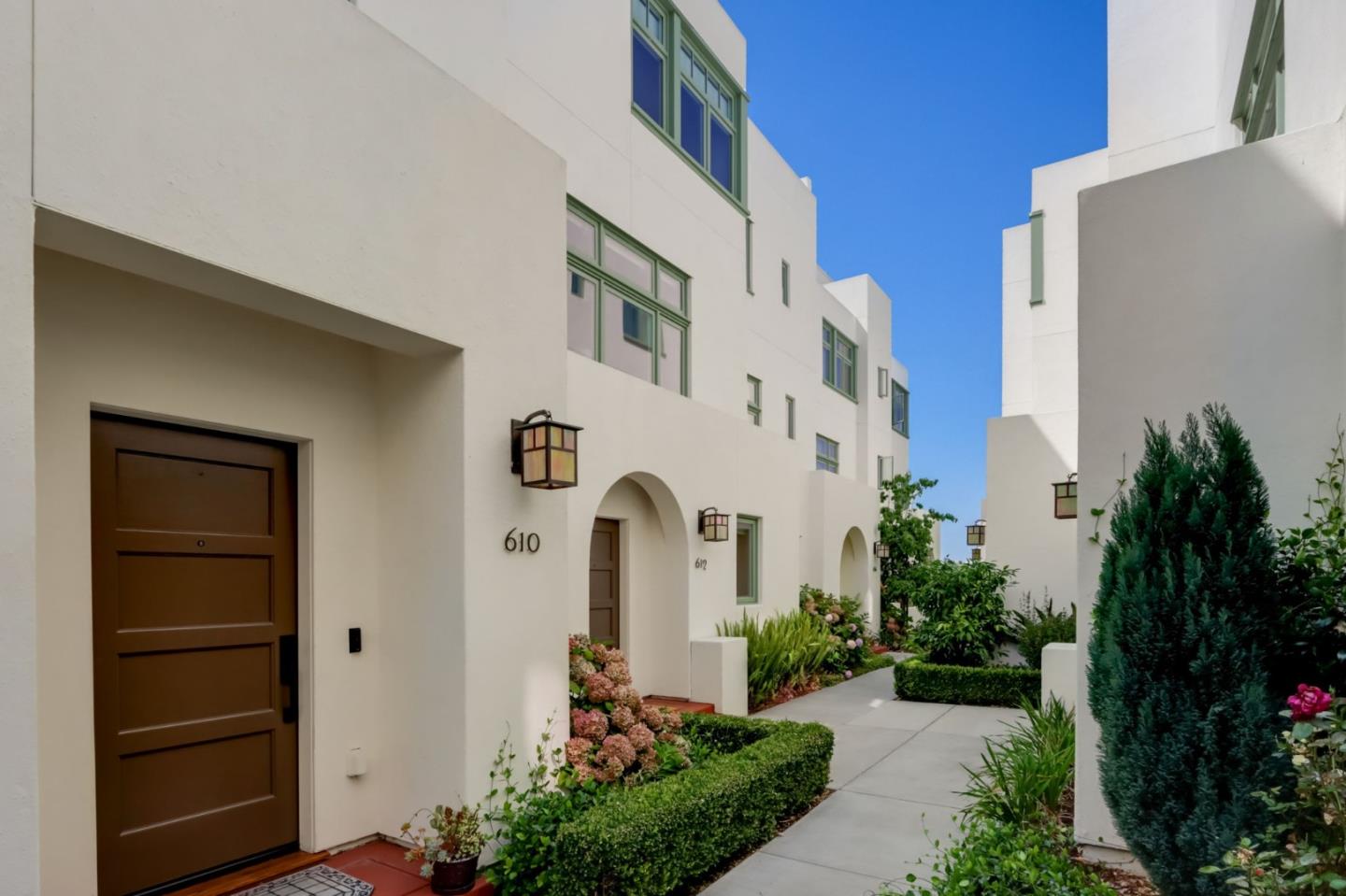612 Allerton Loop Campbell, CA 95008 - Photo 30 of 38 a front view of a house with a garden