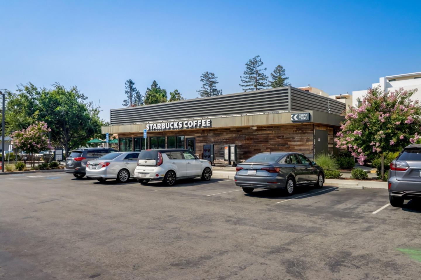 612 Allerton Loop Campbell, CA 95008 - Photo 36 of 38 a view of cars parked in front of a building