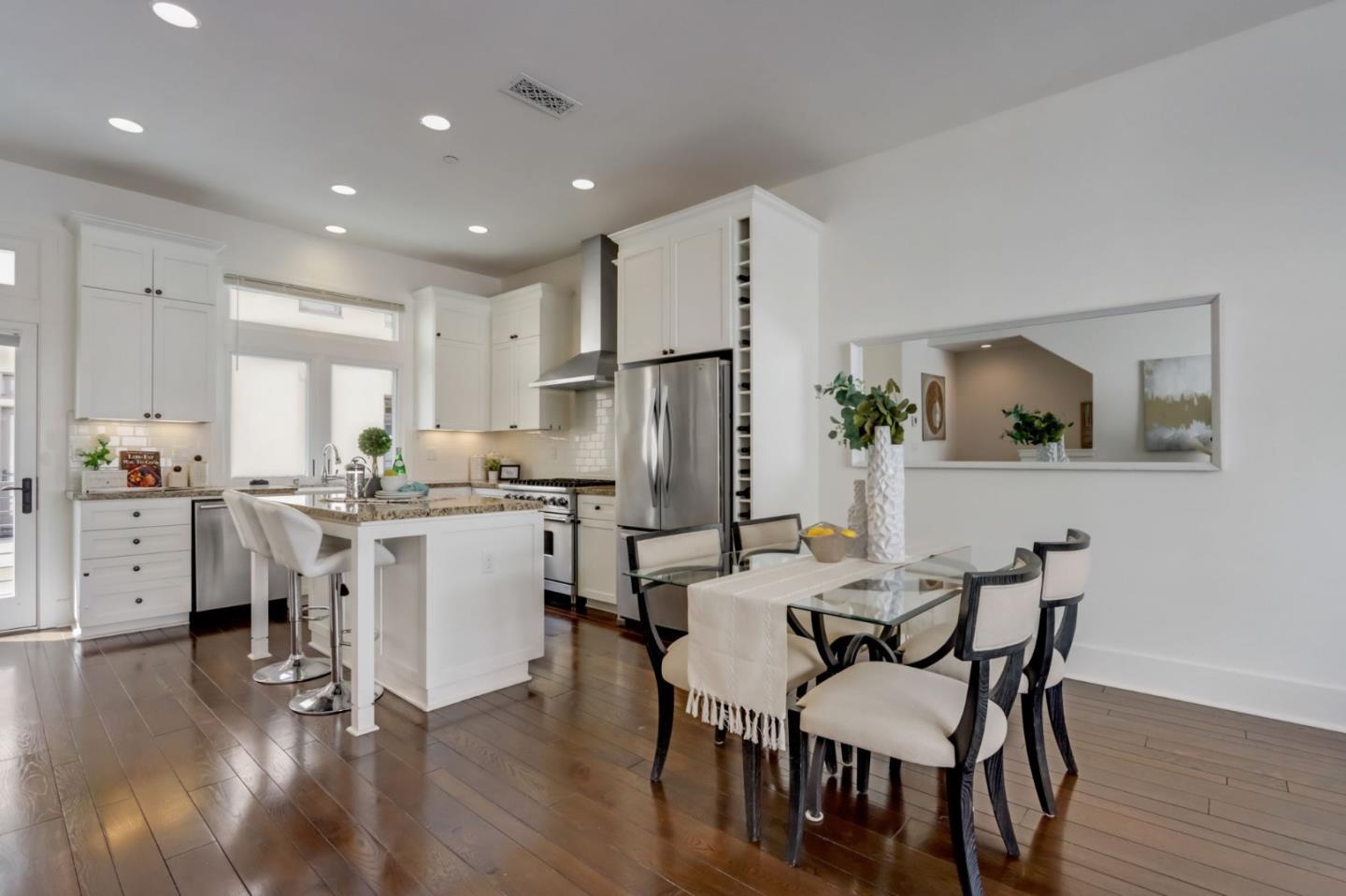 612 Allerton Loop Campbell, CA 95008 - Photo 6 of 38 a view of a dining room with furniture and wooden floor