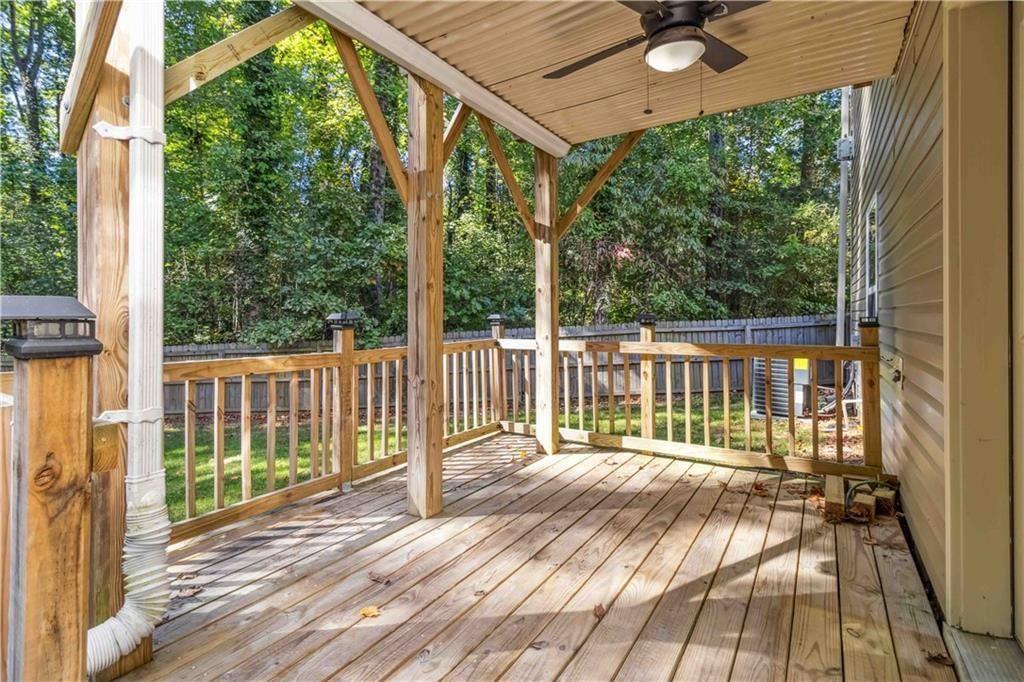100 Heritage Club Circle Dallas, GA 30132 - Photo 23 of 26 a view of a balcony with wooden floor