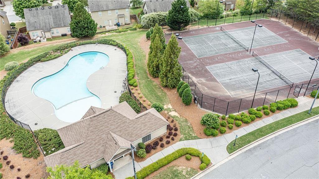 100 Heritage Club Circle Dallas, GA 30132 - Photo 25 of 26 an aerial view of a house with a swimming pool