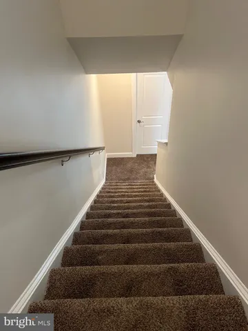 an empty room with closet area