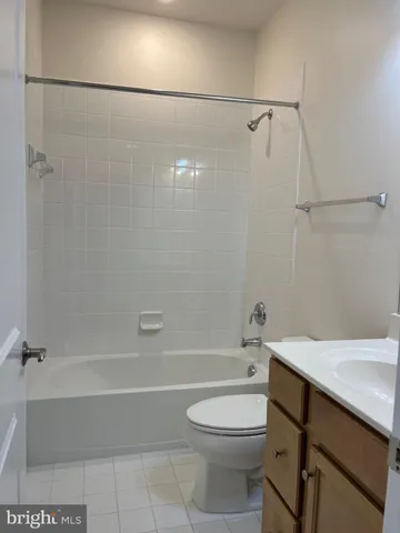 a bathroom with a sink toilet and vanity
