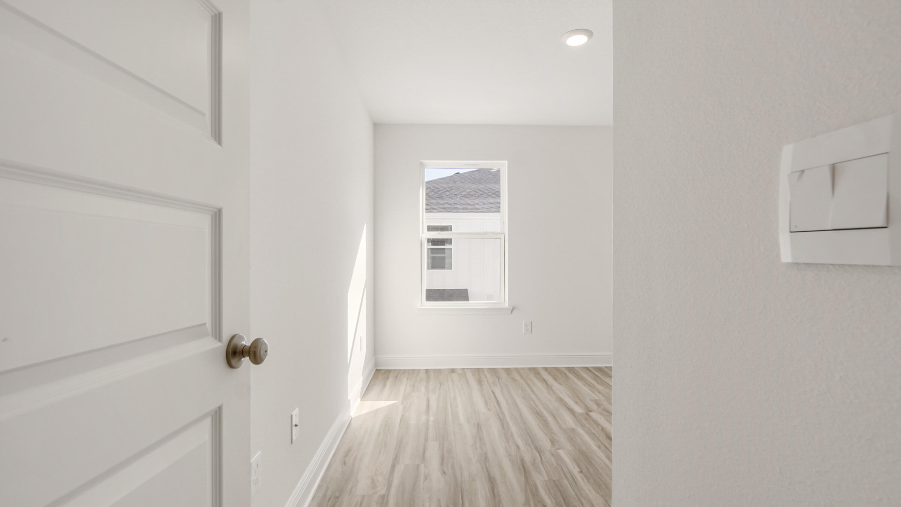 159 Sparrow Avenue Santa Rosa Beach, FL 32459 - Photo 19 of 35 a view of a hallway with wooden floor and closet