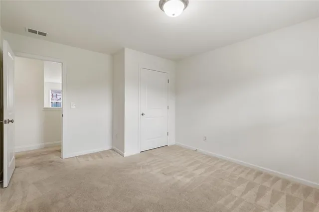 an empty room with a natural light