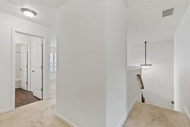 a view of a hallway with closet